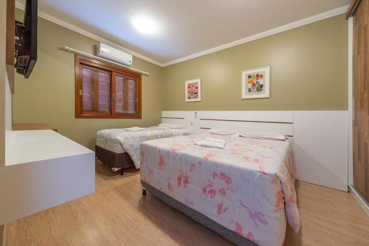 GRAMADO SOLAR REAL - 2 apts de 2 quartos no mesmo prédio, cada um comporta até 7 pessoas - IDEAL PARA GRUPOS - central - IDEAL PARA ANDAR A PÉ - nesta plataforma desde janeiro de 2015, oferecemos CREDIBILIDADE - seu PET é bem-vindo - GARAGEM COBERTA Exterior foto